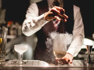 Bartender preparing a signature cocktail for a mobile bar event in North Las Vegas